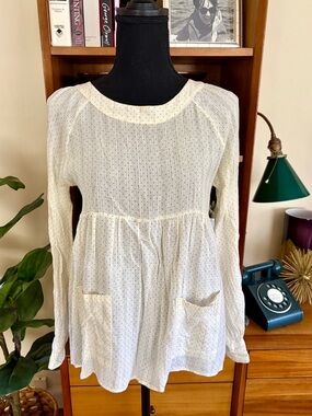 Lux Cream Long-Sleeve Peplum Tunic with Subtle Dot Pattern